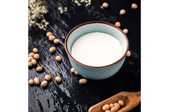 Bowl of soy milk with soybeans